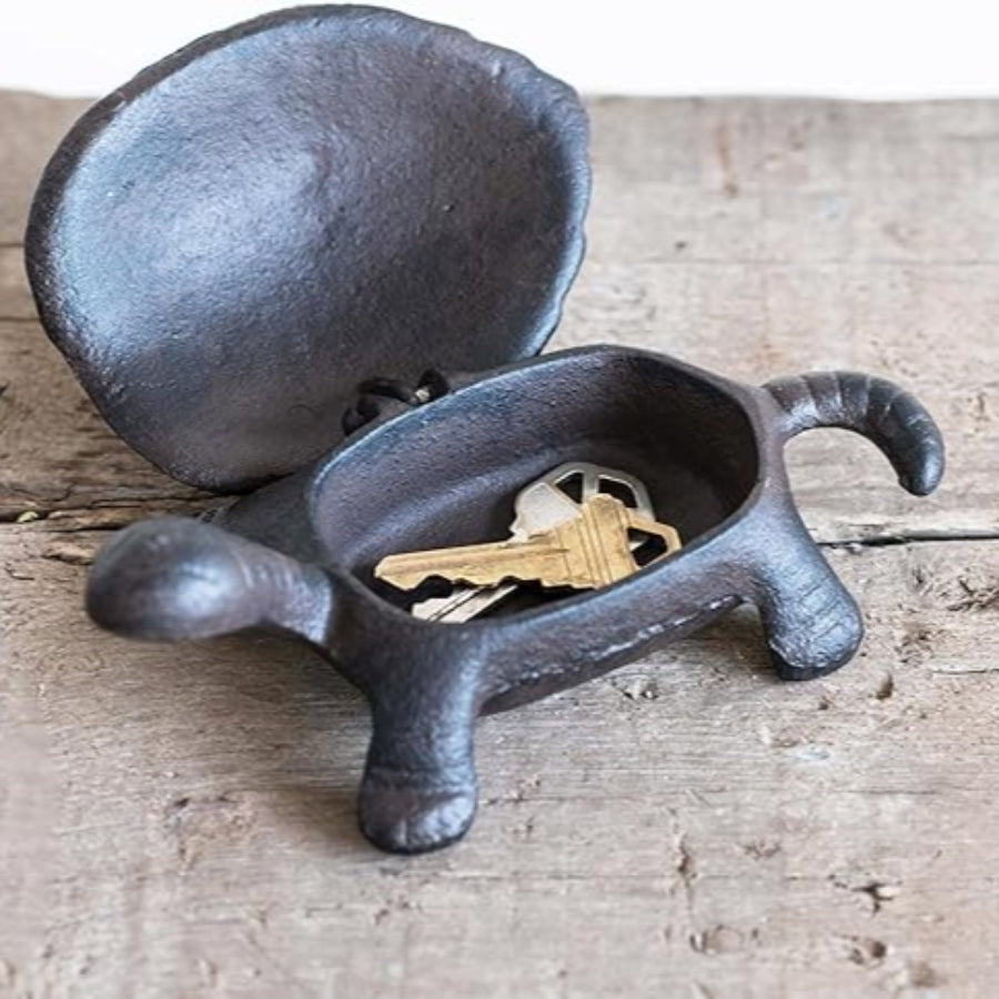 Decorative cast iron tortoise-shaped key box in black color.