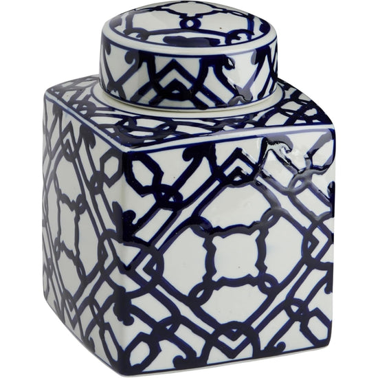 Ceramic jar with blue and white geometric pattern on a white background