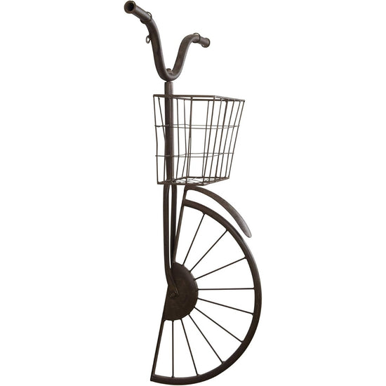 Decorative metal bike with a basket on a white background