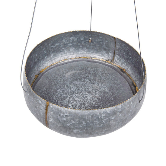 Metal hanging planter on a white background