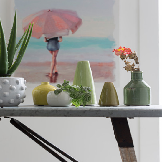 Set of 4 multicolored terracotta vases in assorted sizes, decorative rustic pottery for home décor.