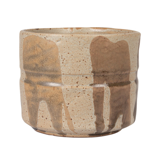 Ceramic pot with brown and beige pattern on a white background