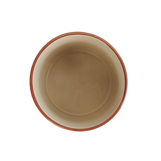 A cylindrical stoneware planter with a rust and white footed design featuring an abstract print.