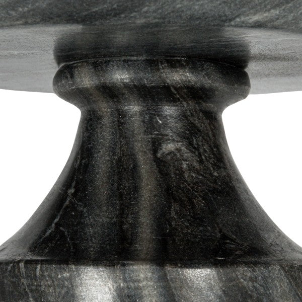 A round grey marble pedestal bowl with a smooth finish, sitting on a sturdy base.