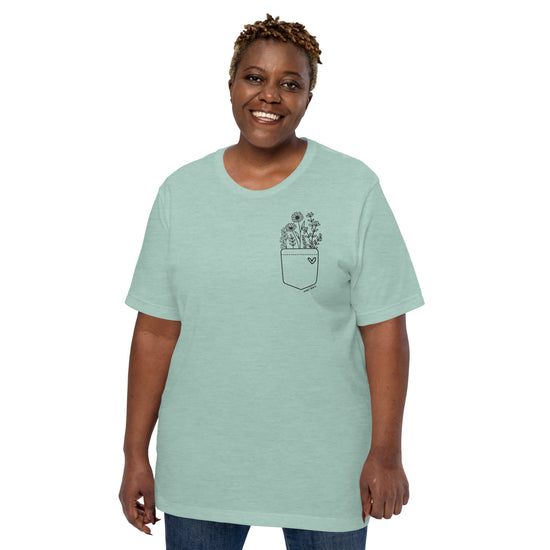 A 'Herb Lover' unisex t-shirt with a pocket and herb illustration on the front.