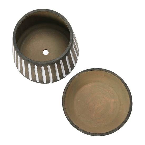 A brown terracotta pot with white stripes pattern, including a saucer, displayed against a white background.