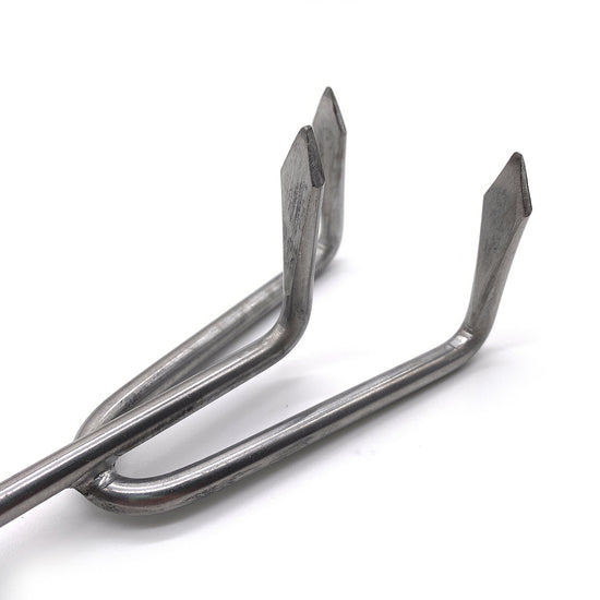 A Ferry-Morse premium garden cultivator with an ash wood handle and a stainless steel three-prong head, featuring a leather strap.