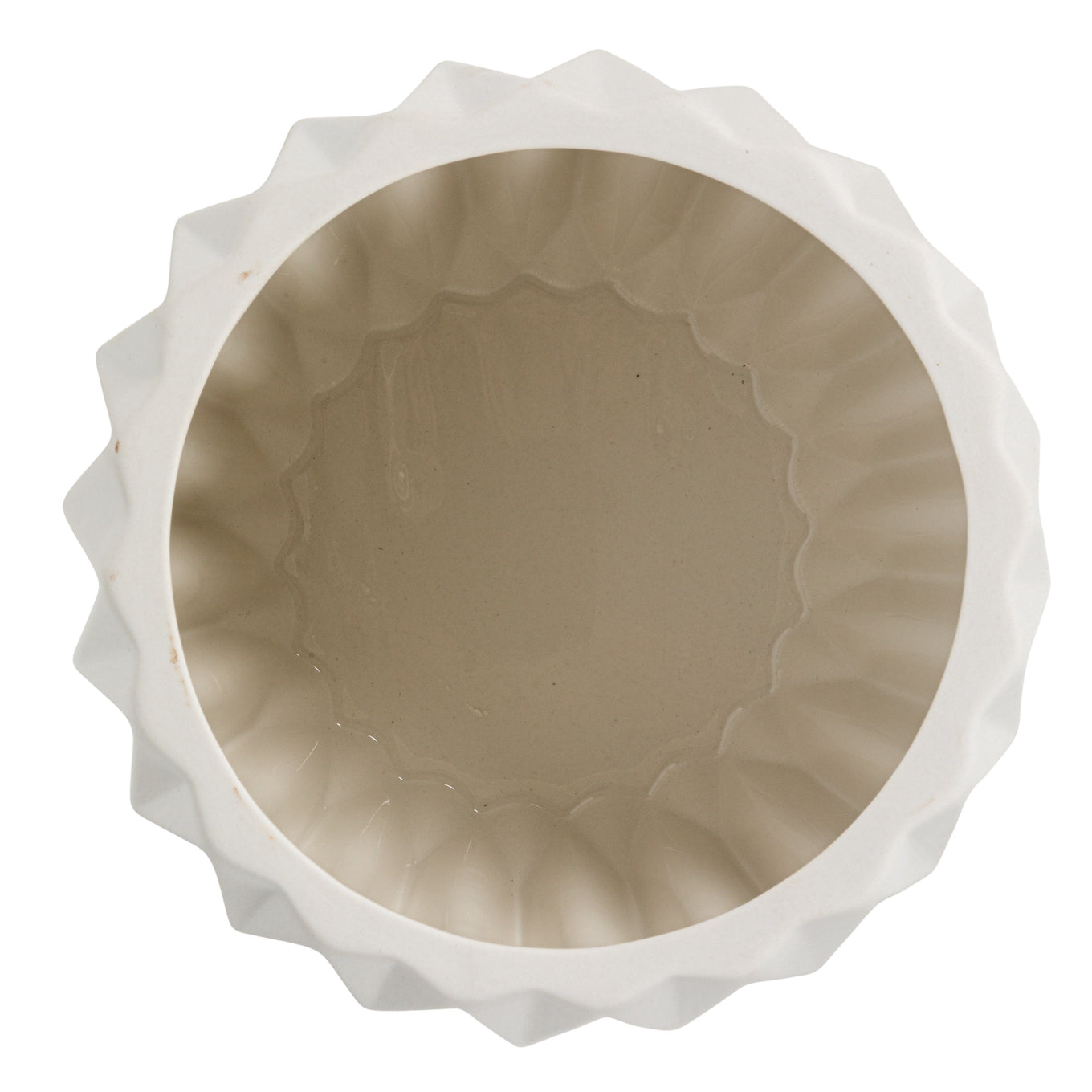 White ceramic pie dish with scalloped edge on a white background