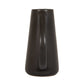 Black ceramic pitcher on a white background