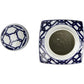 Square ceramic dish with blue geometric pattern on a white background