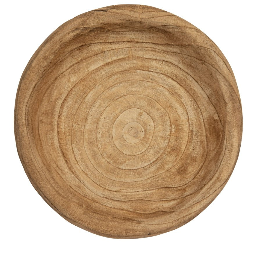 Wooden cutting board with concentric circular patterns on a white background