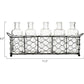 Metal wire basket with five clear glass bottles on a white background