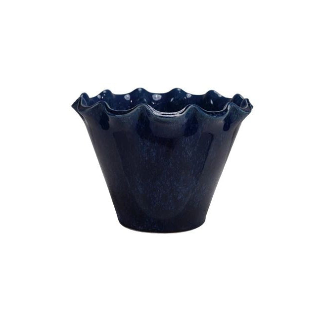 Dark blue ceramic planter with ruffled edge on a white background