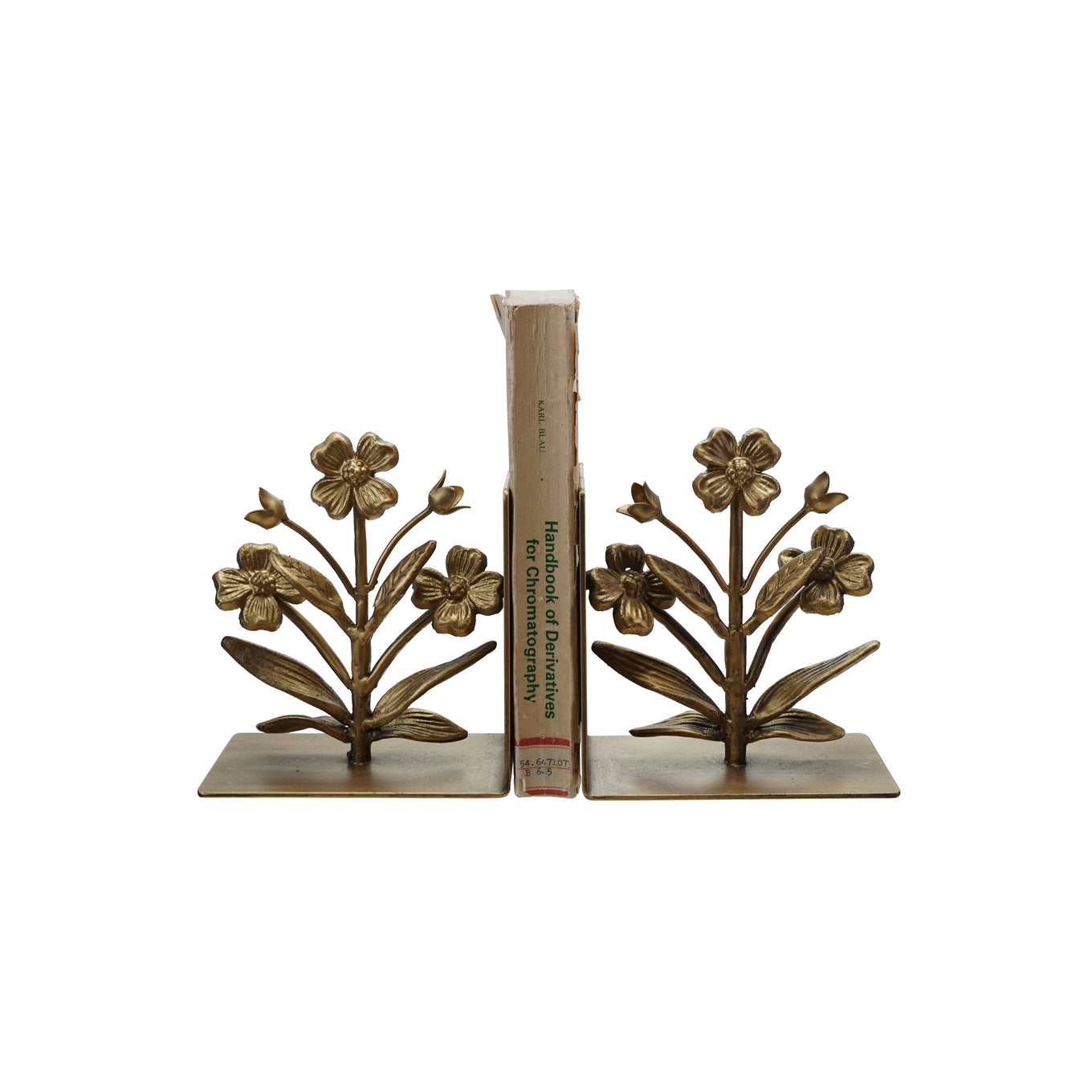 A pair of gold finish cast metal flower bookends with intricate floral designs on a square base.