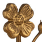 Cast metal flower bookends with intricate floral designs on a square base.