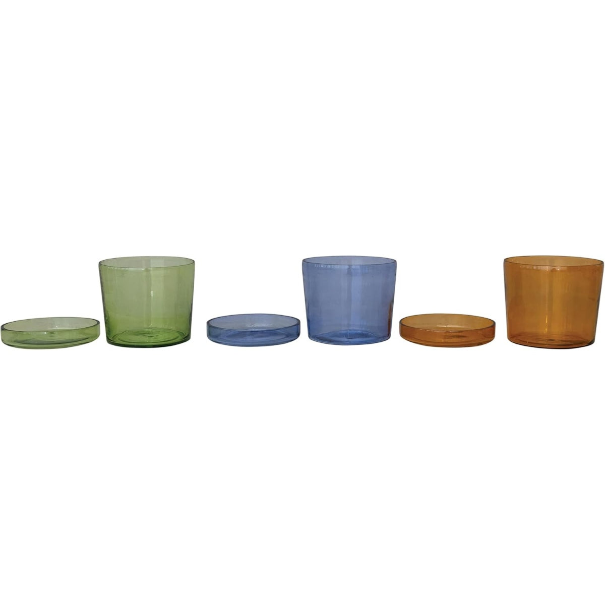 Set of colorful glass containers on a white background