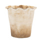 Beige Terracotta planter with a textured surface on a white background