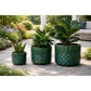 green planters outside 