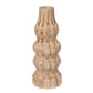 Wooden vase with textured design on a white background
