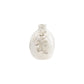 White ceramic vase with floral designs on a white background