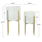 Two white textured planters with gold stands on a white background