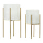 Two white textured planters with gold stands on a white background