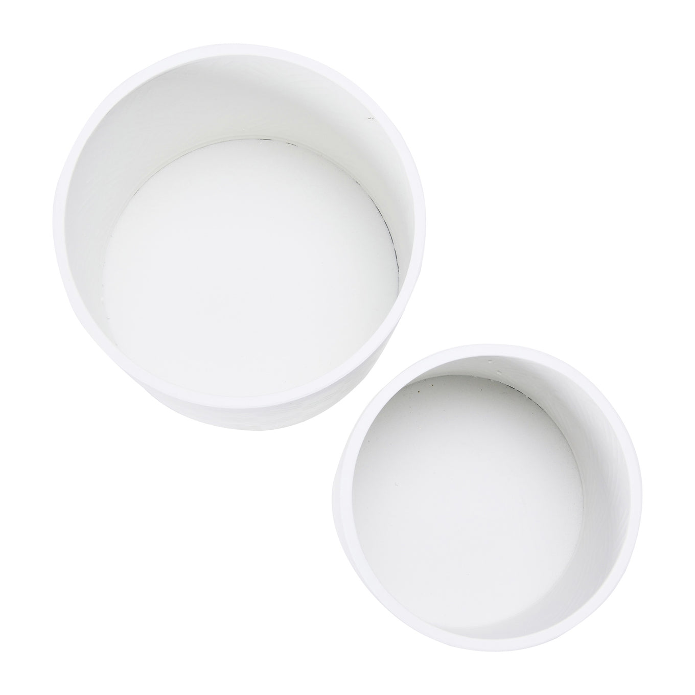 Two white ceramic bowls on a white background