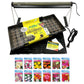 Gardening kit with seed packets, grow light, and Jiffy greenhouse kit on a white background