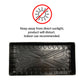 Black plastic tray with warning label about direct sunlight exposure on a white background
