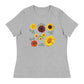 A crew neck t-shirt with a graphic of sunflowers in different colors on the front.